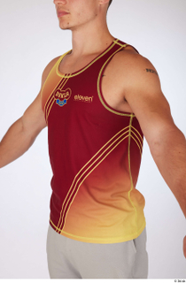 Darren dressed red-yellow tank top sports upper body 0002.jpg